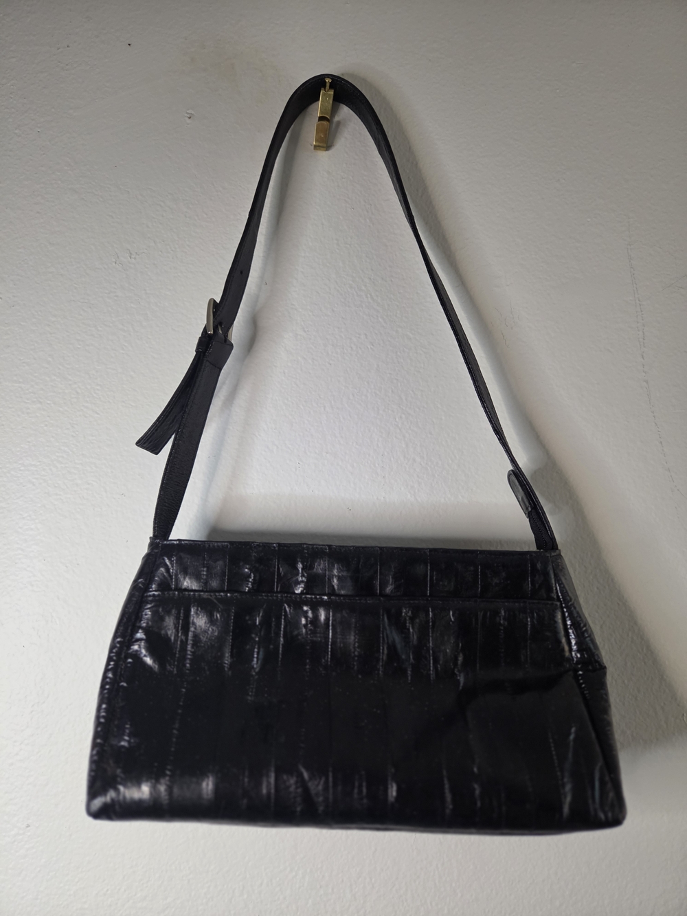 Sleek Black Shoulder Bag with Adjustable Strap